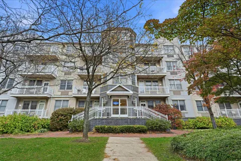 a kitchen with a sink stove and refrigerator
