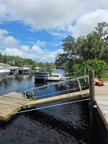 a view of a swimming pool with a lake