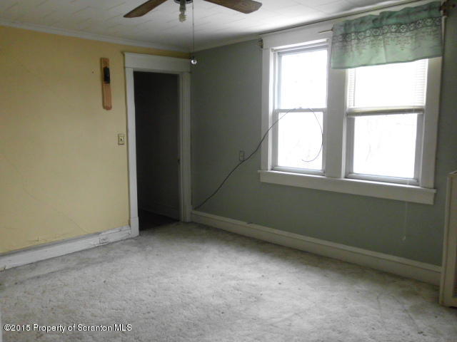 139 Spring Street Carbondale, PA 18407 - Photo 16 of 25 an empty room with a window