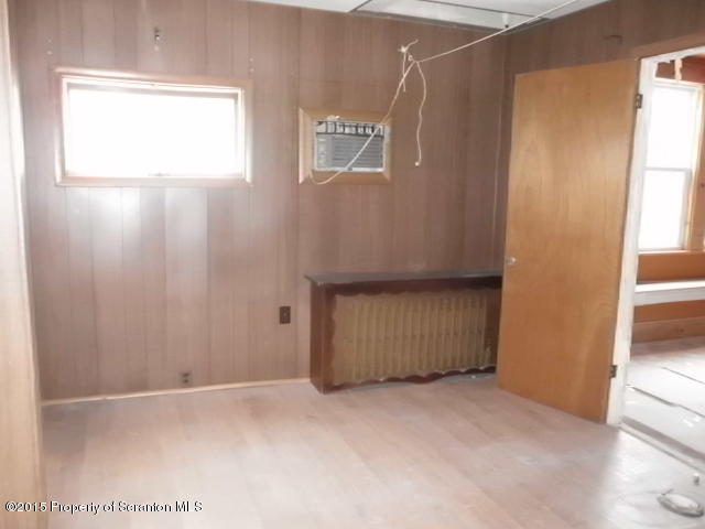 139 Spring Street Carbondale, PA 18407 - Photo 10 of 25 a view of an empty room and window