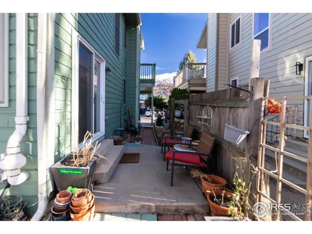 a outdoor living space with furniture and a fireplace