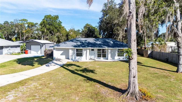 front view of a house with a yard