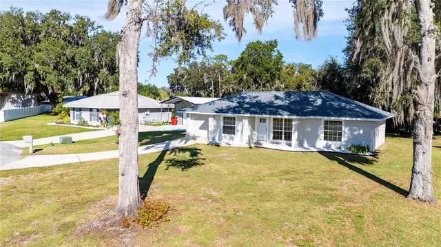 a view of a house with swimming pool