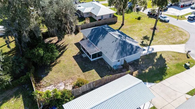 a view of a balcony with wooden floor