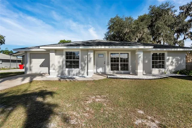 front view of a house with swimming pool