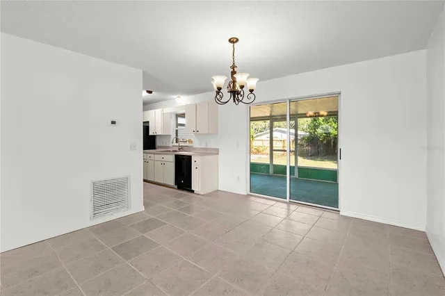 a view of a kitchen with a sink and dishwasher kitchen view