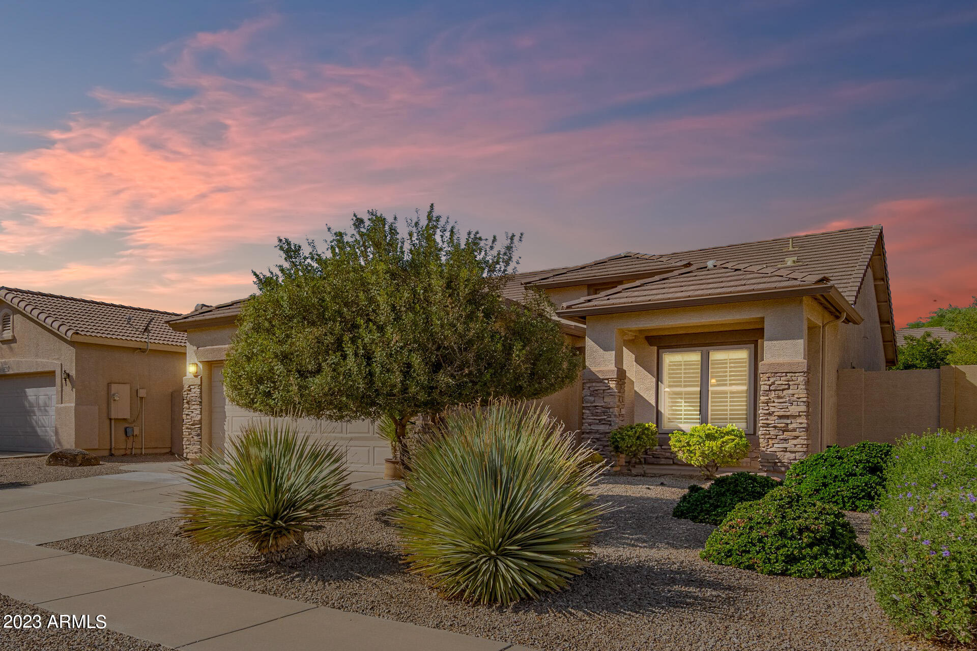 2792 East Superior Road San Tan Valley, AZ 85143 - Photo 2 of 30 Twilight Showcasing Stone Facade