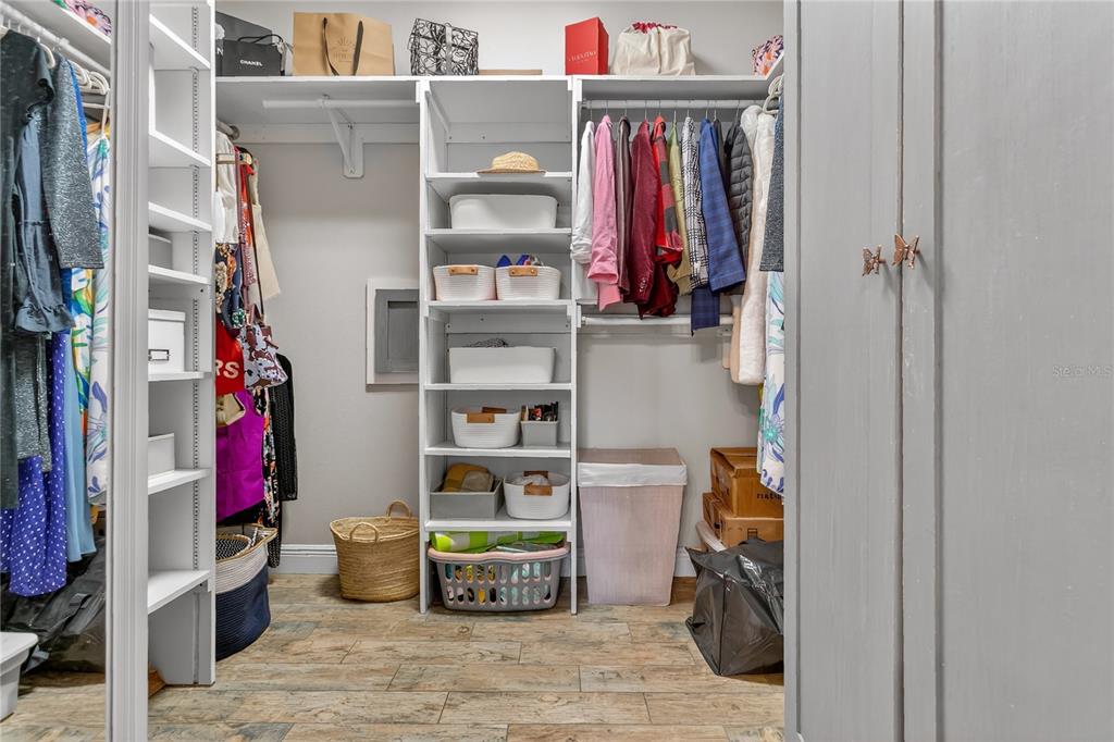 1795 Brumley Road Chuluota, FL 32766 - Photo 18 of 41 a view of walk in closet with clothes and shoes