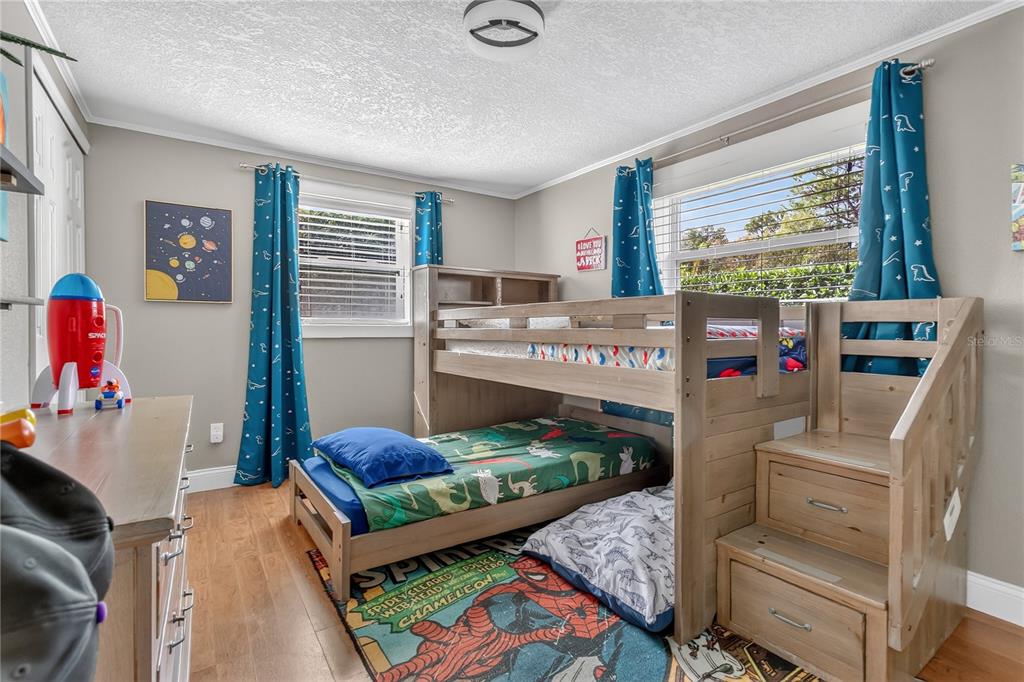 1795 Brumley Road Chuluota, FL 32766 - Photo 20 of 41 a living room with furniture and a flat screen tv