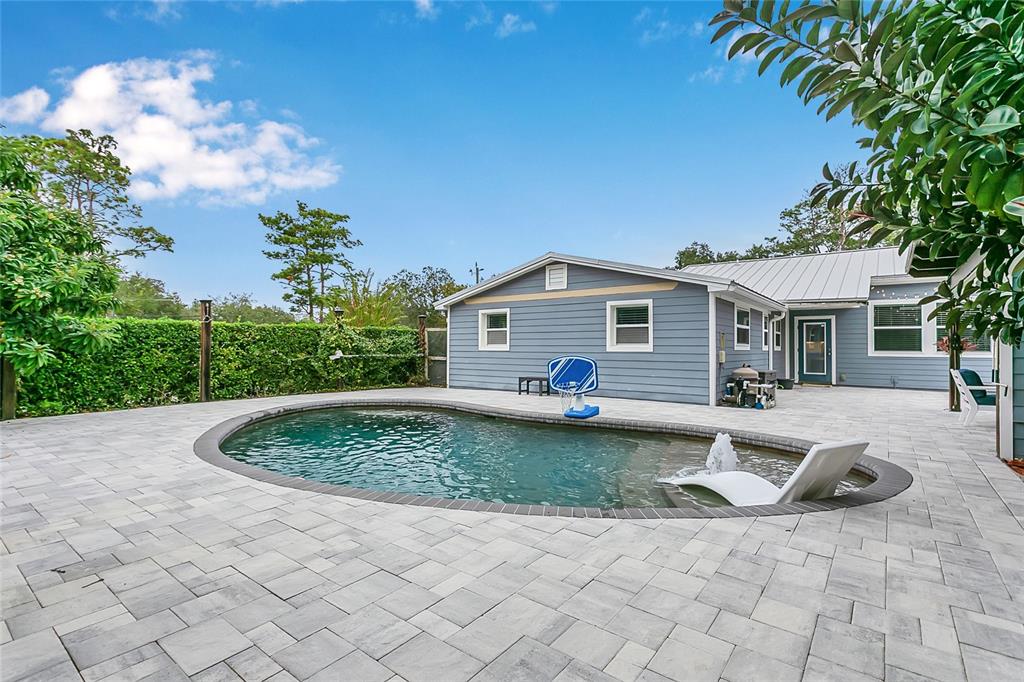 1795 Brumley Road Chuluota, FL 32766 - Photo 27 of 41 a view of a house with backyard