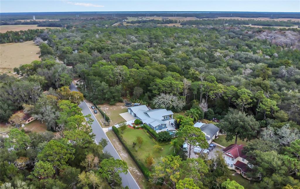 1795 Brumley Road Chuluota, FL 32766 - Photo 38 of 41 an aerial view of a house with a yard