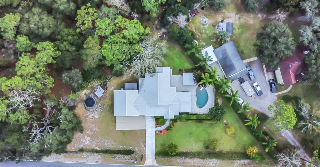 1795 Brumley Road Chuluota, FL 32766 - Photo 40 of 41 an aerial view of residential houses with outdoor space and trees