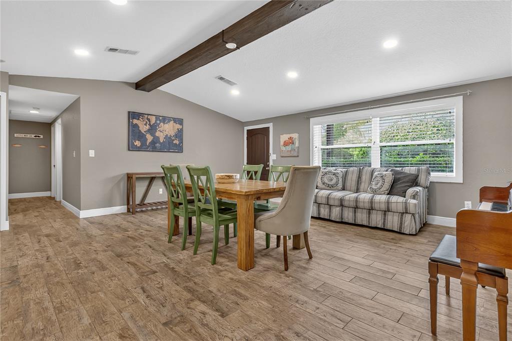 1795 Brumley Road Chuluota, FL 32766 - Photo 6 of 41 a living room with furniture and a large window