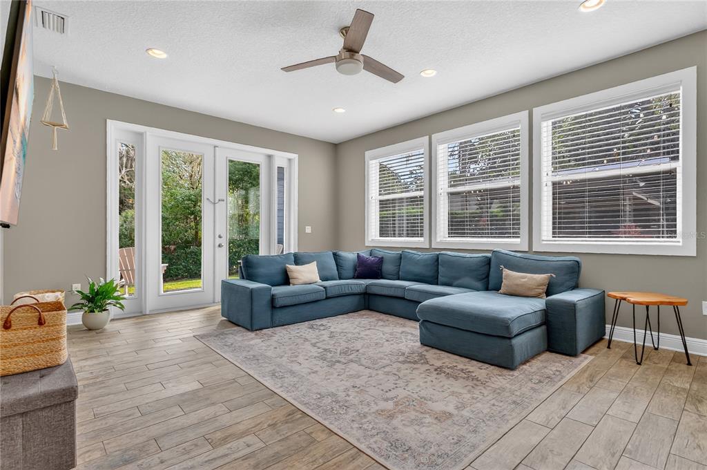 1795 Brumley Road Chuluota, FL 32766 - Photo 7 of 41 a living room with furniture and windows