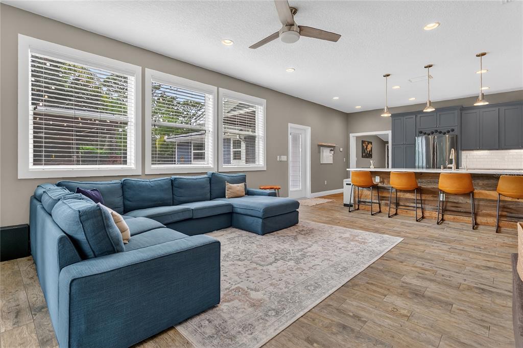 1795 Brumley Road Chuluota, FL 32766 - Photo 9 of 41 a living room with furniture and a large window