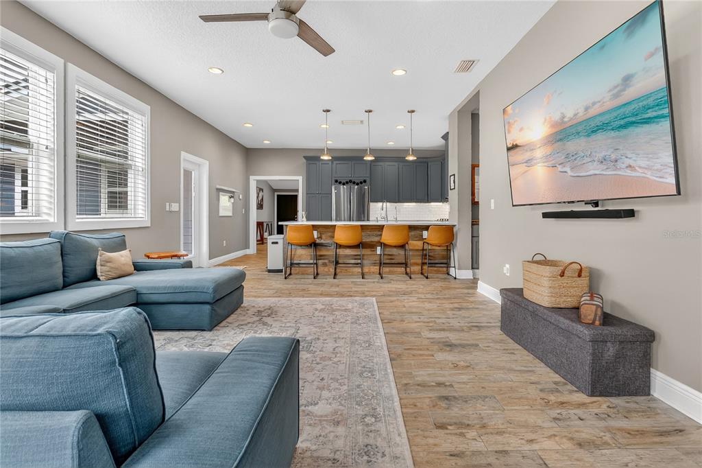 1795 Brumley Road Chuluota, FL 32766 - Photo 10 of 41 a living room with furniture and wooden floor