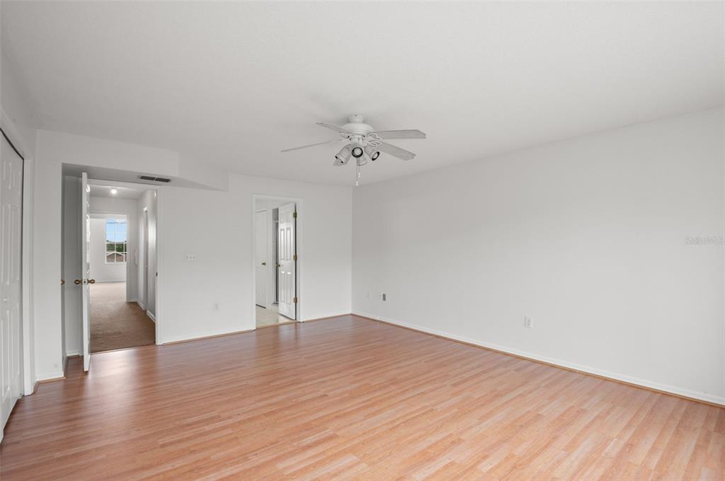 1644 Arabian Lane Palm Harbor, FL 34685 - Photo 35 of 52 a view of an empty room and wooden floor