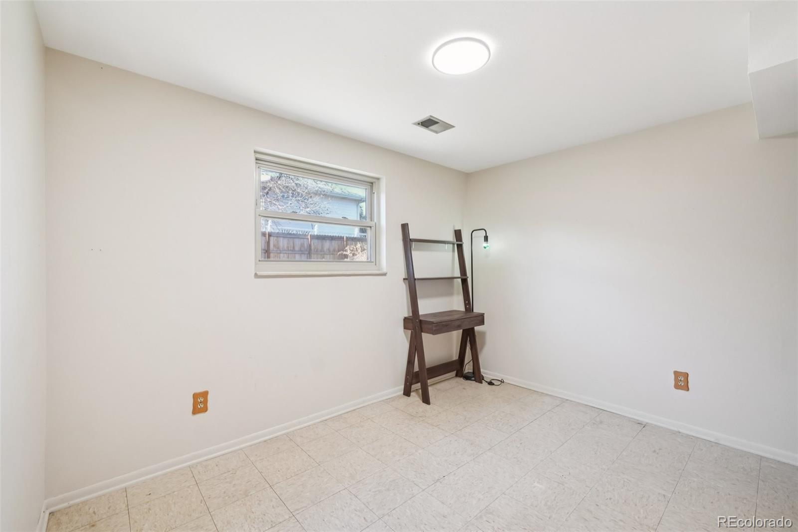 6277 Reed Court Arvada, CO 80003 - Photo 19 of 40 a view of room with window