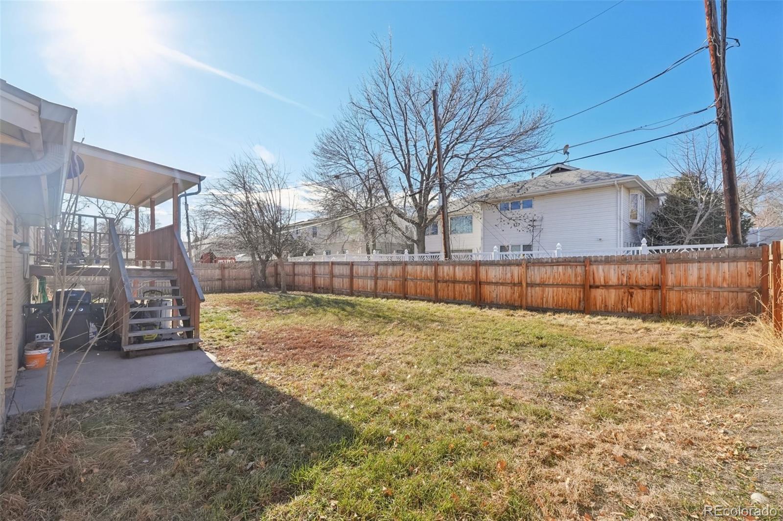 6277 Reed Court Arvada, CO 80003 - Photo 20 of 40 a view of a backyard