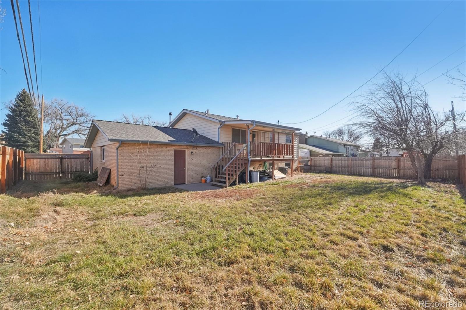 6277 Reed Court Arvada, CO 80003 - Photo 24 of 40 a backyard of a house
