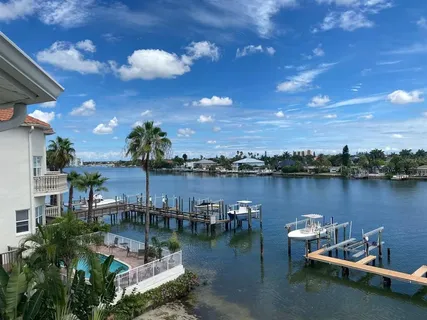 a view of a lake with sitting area