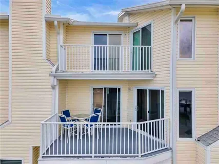 a view of a house with a deck