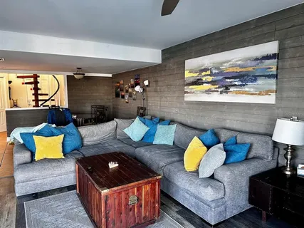 a living room with furniture and a couch