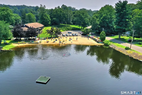 a view of a lake with a big yard