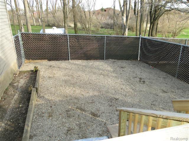 4093 Peters Road Columbiaville, MI 48421 - Photo 25 of 32 Dog Gravel Area.jpg