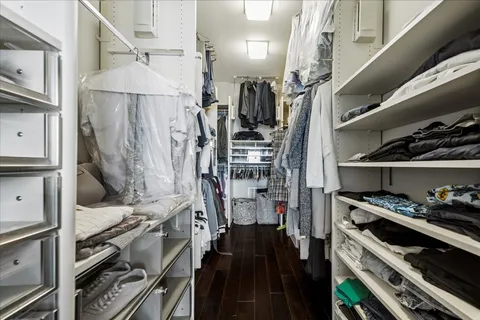 a kitchen with a stove and a refrigerator