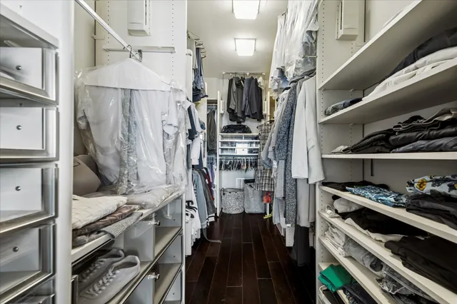 a kitchen with a stove and a refrigerator