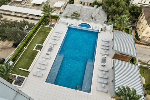 a view of a yard with chairs