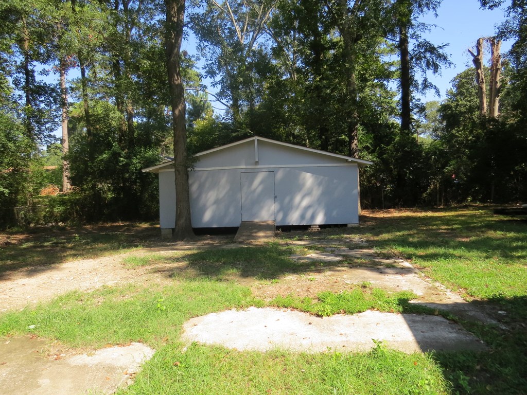 4247 Forrest Road Columbus, GA 31907 - Photo 12 of 17 a view of a backyard with large trees