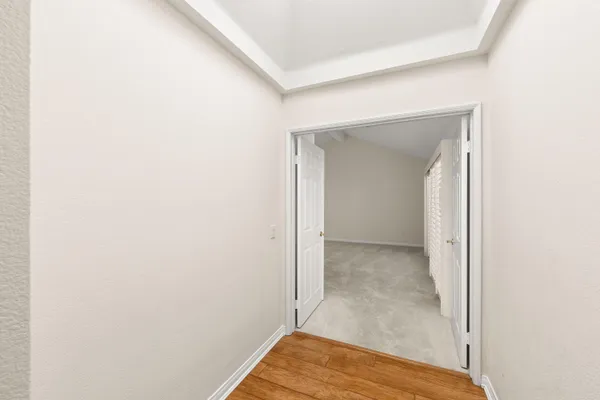 a view of an empty room and window