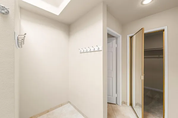 a view of an empty room with a window