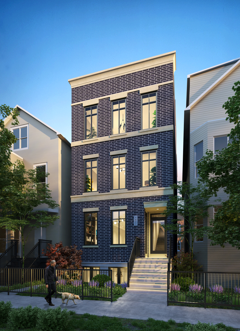 1447 West Roscoe Street, Unit PH Chicago, IL 60657 - Photo 1 of 2 a front view of residential houses with yard