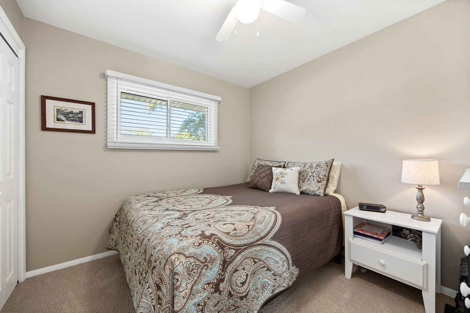 723 Inverness Road Lisle, IL 60532 - Photo 18 of 40 a bedroom with a bed and a window