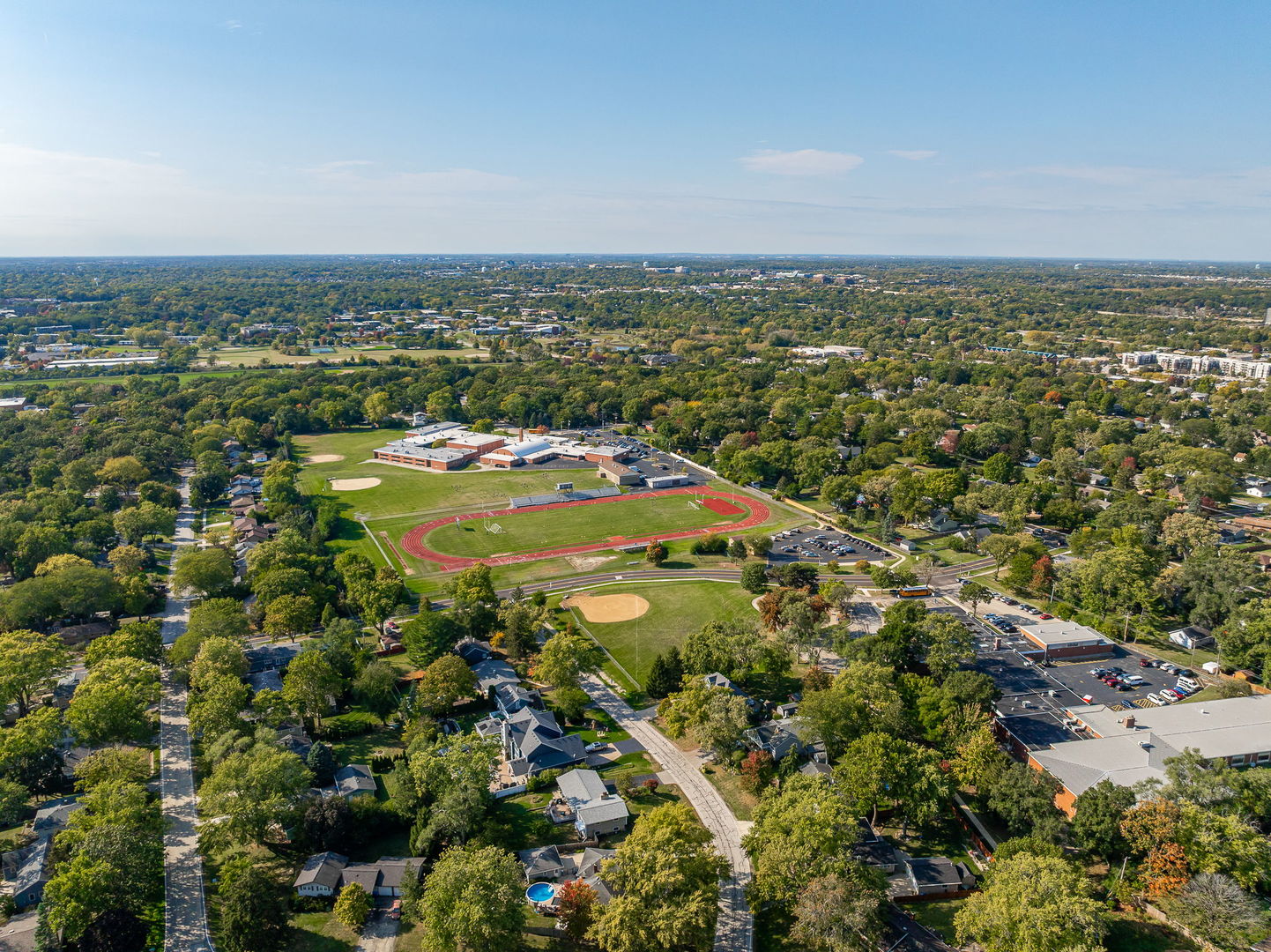723 Inverness Road Lisle, IL 60532 - Photo 36 of 40 an aerial view of residential building and lake