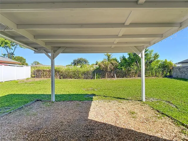a view of a porch with a big yard