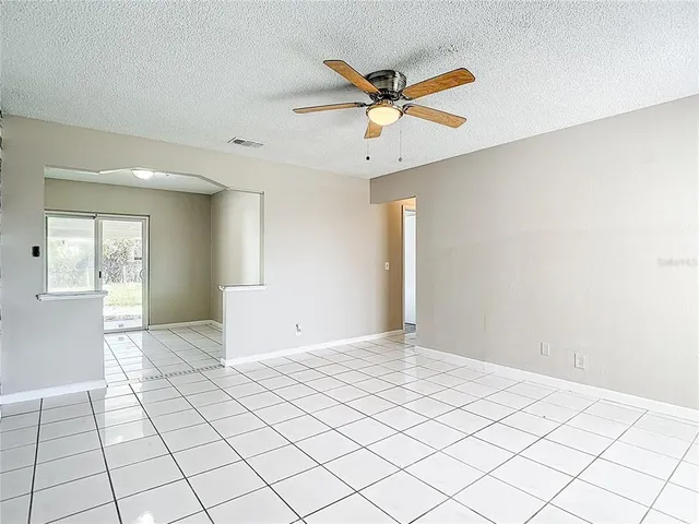 a view of an empty room and window