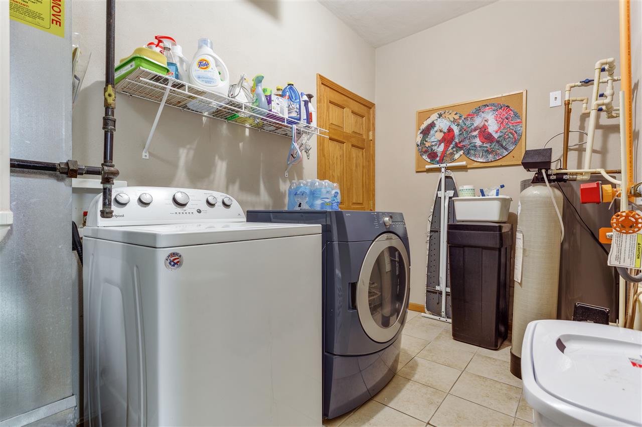 10181 Monarch Road, Unit 3 Roscoe, IL 61073 - Photo 15 of 15 a utility room with dryer washer and a view of bathroom
