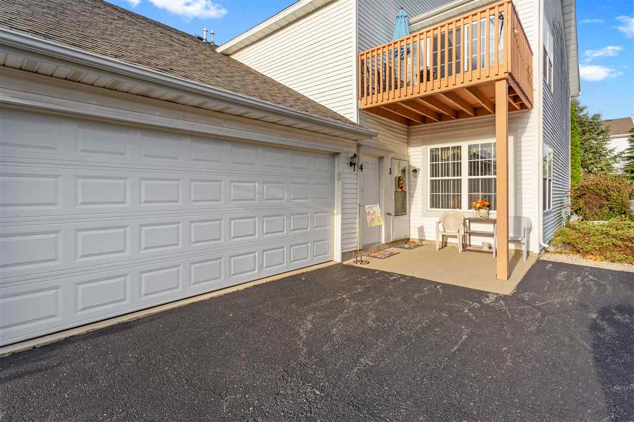 10181 Monarch Road, Unit 3 Roscoe, IL 61073 - Photo 2 of 15 a view of a house with a garage
