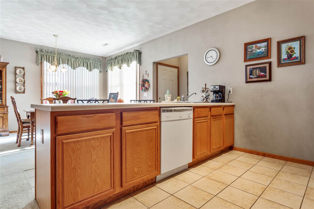 10181 Monarch Road, Unit 3 Roscoe, IL 61073 - Photo 5 of 15 a very nice looking room with a large window