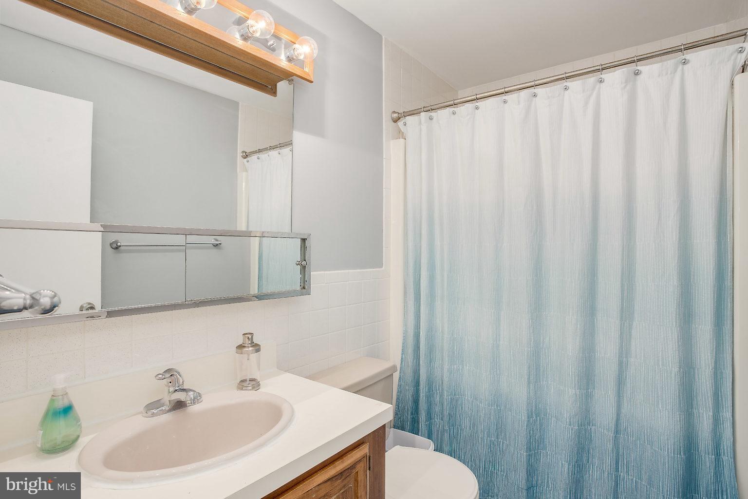 517 Bathurst Road Baltimore, MD 21228 - Photo 17 of 27 freshly painted hall bathroom