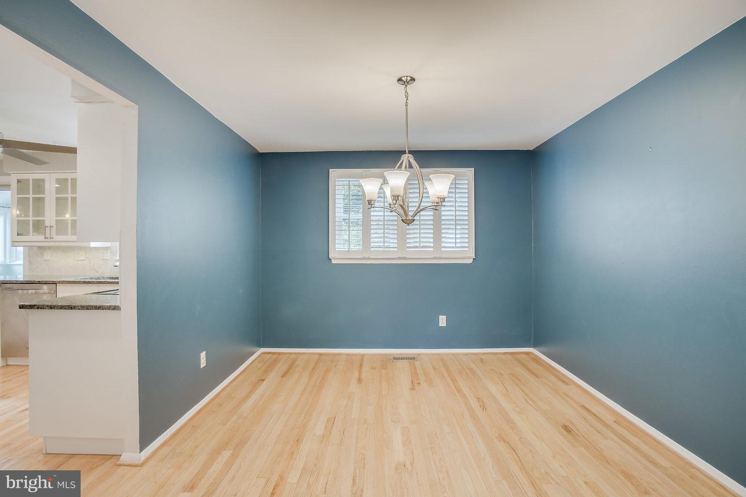 517 Bathurst Road Baltimore, MD 21228 - Photo 6 of 27 Dining Room with plantation shutters!!