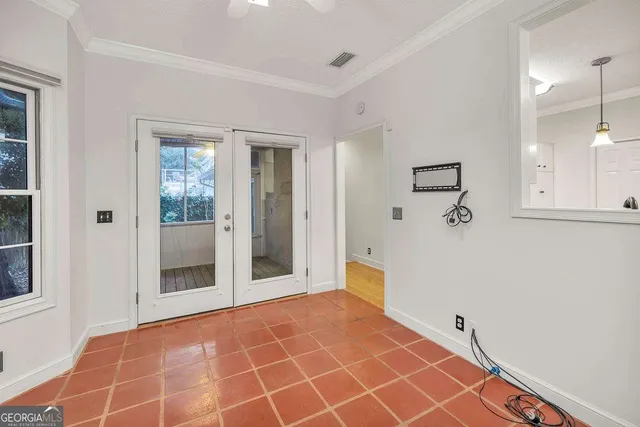 a view of a hallway with a door