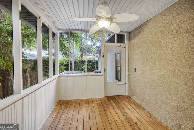 a view of a room with a large window