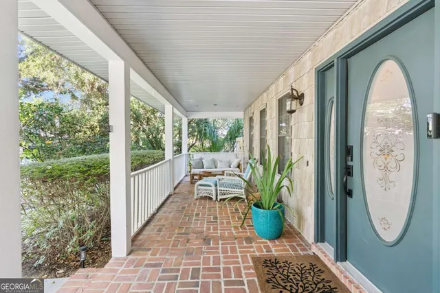 a view of entryway with wooden floor