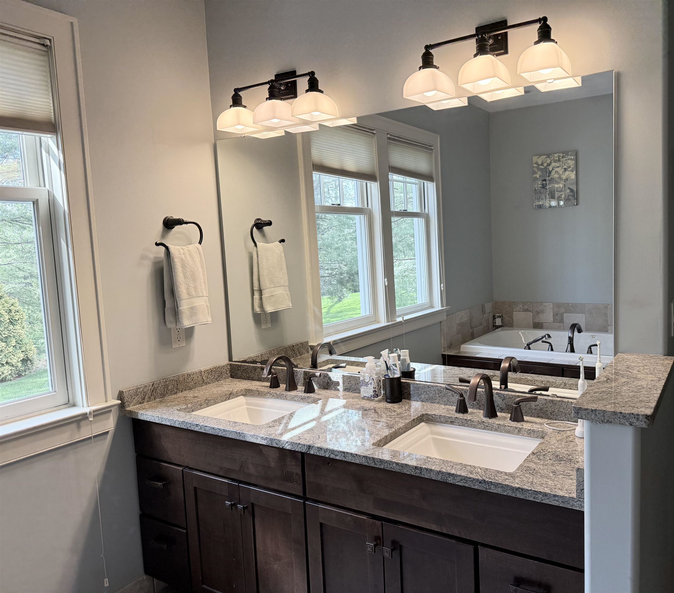 7432 Timber Ridge Road Roscoe, IL 61073 - Photo 14 of 17 a bathroom with a sink and a mirror