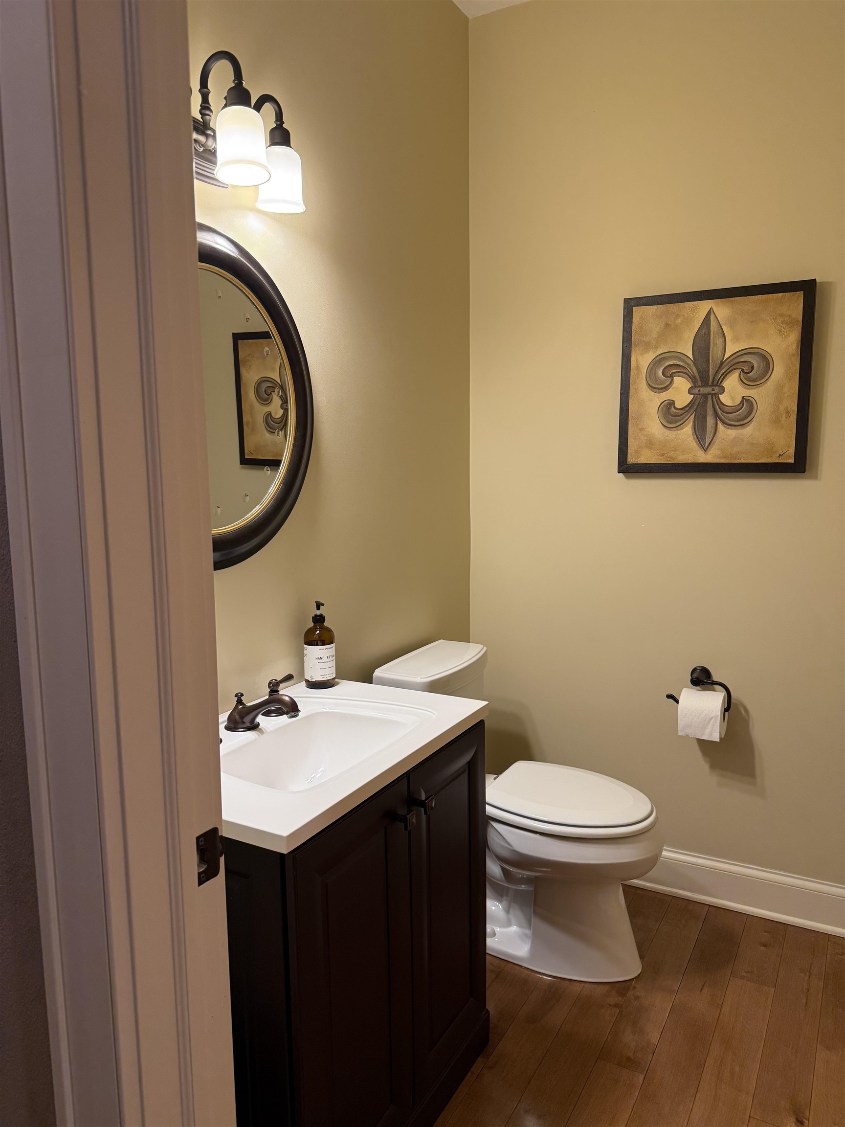 7432 Timber Ridge Road Roscoe, IL 61073 - Photo 16 of 17 a bathroom with a sink mirror and toilet